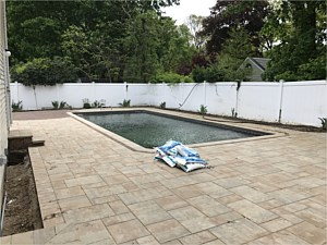 nicolock chesapeake alpine contemporary smooth pavers oyster blend circle kit double border pool patio brick pavers fire pit by pool_1
